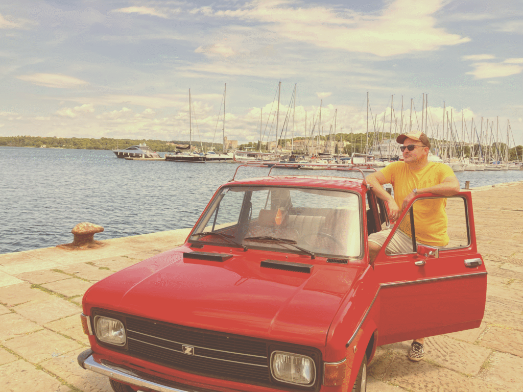 Guests enjoying a vintage car experience in Pula with Yugorama